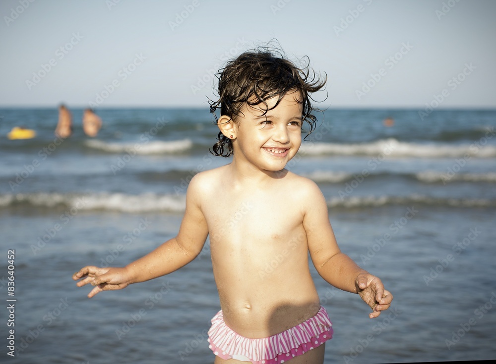 Foto Stock Niña en la playa