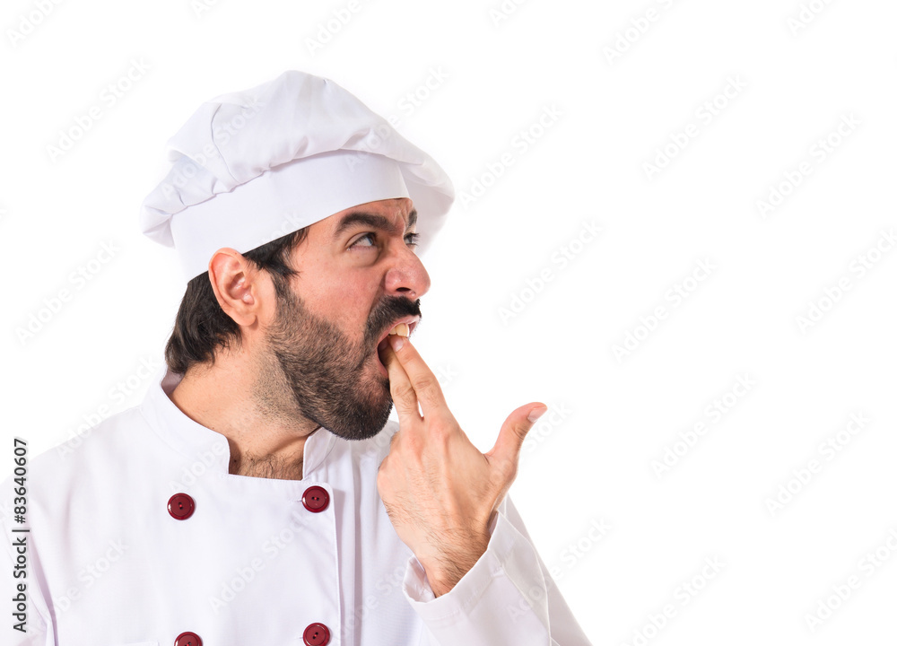 Chef making suicide gesture over white background Chef making suicide gesture over white background