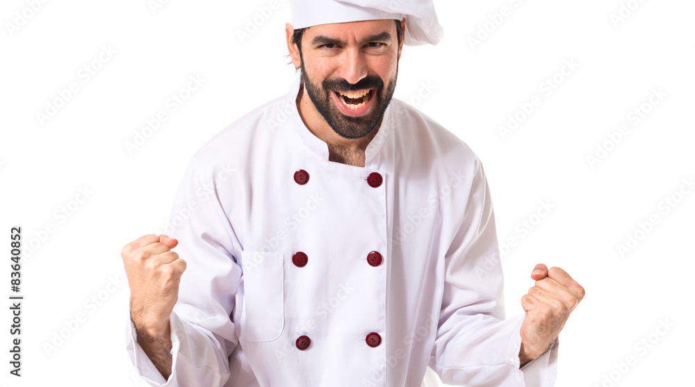 Lucky chef over isolated white background