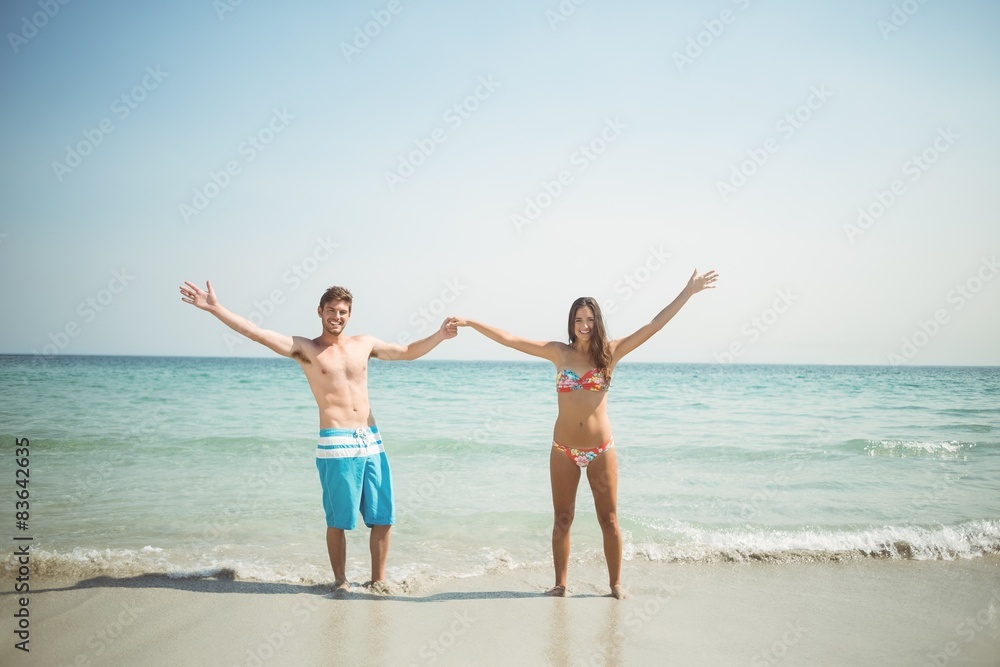 happy couple smiling at camera happy couple smiling at camera