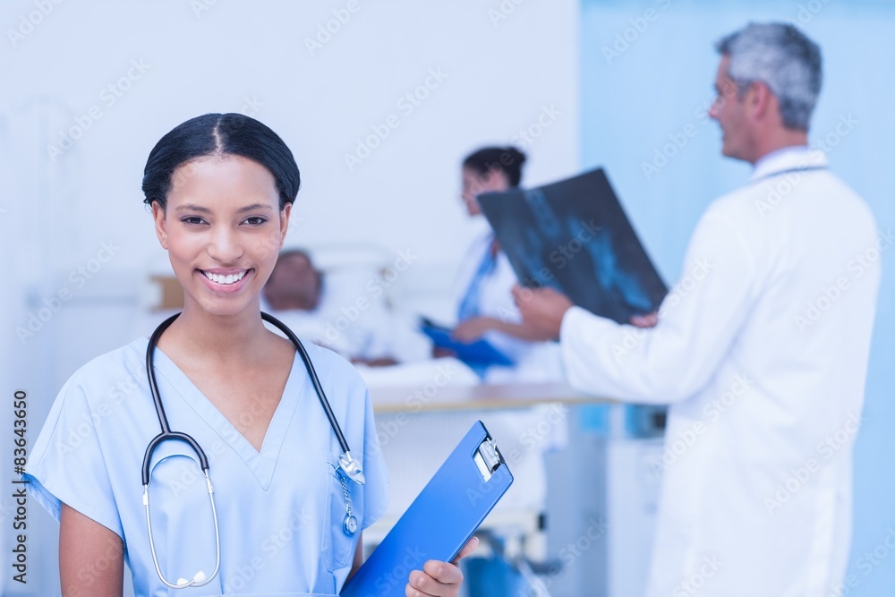 Doctors and patient with x-ray in hospital Doctors and patient with x-ray in hospital