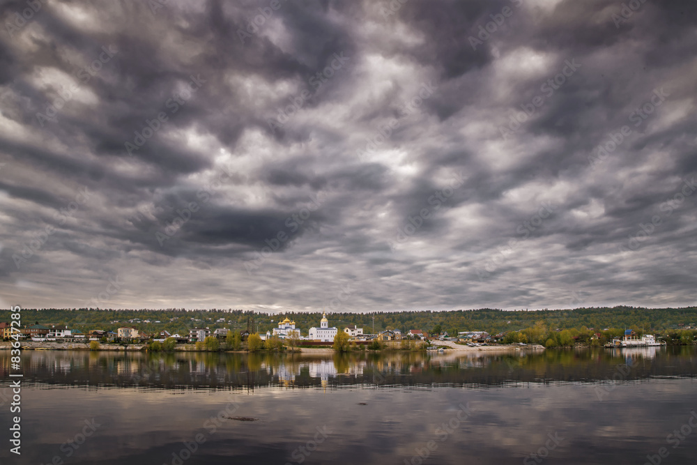 Obraz premium dark clouds river temple.