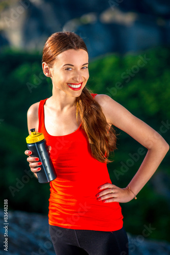 Sport woman in the mountains