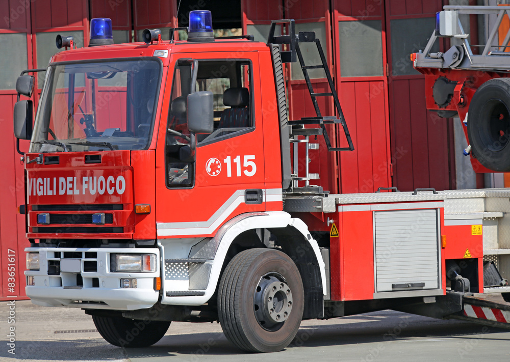 fire trucks with lettering on the door