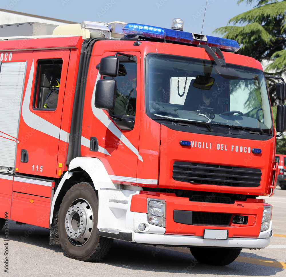 large fire trucks quickly runs during an emergency large fire trucks quickly runs during an emergency