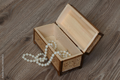 small handmade casket casket from birch bark with a beautiful pattern with jewels