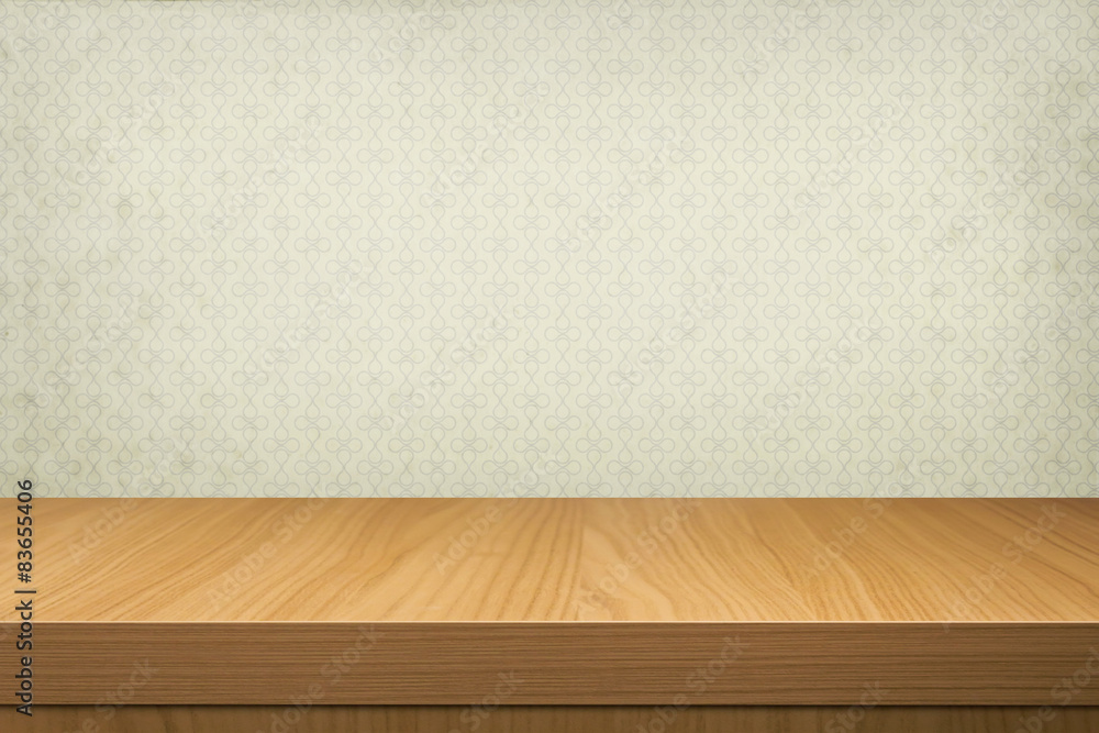 Empty wooden table over retro wallpaper Empty wooden table over retro wallpaper