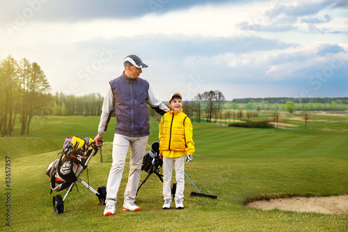 Father with son at golf