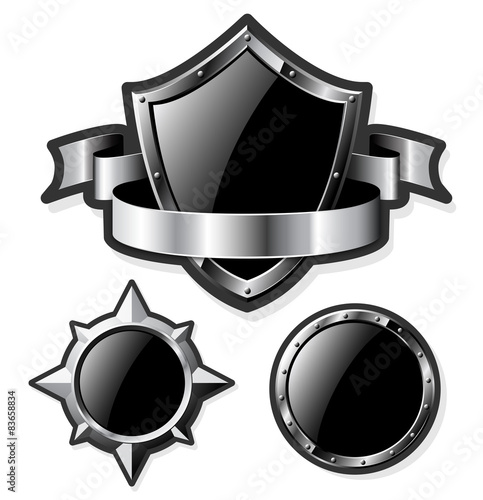 Set of steel glossy shields isolated on white