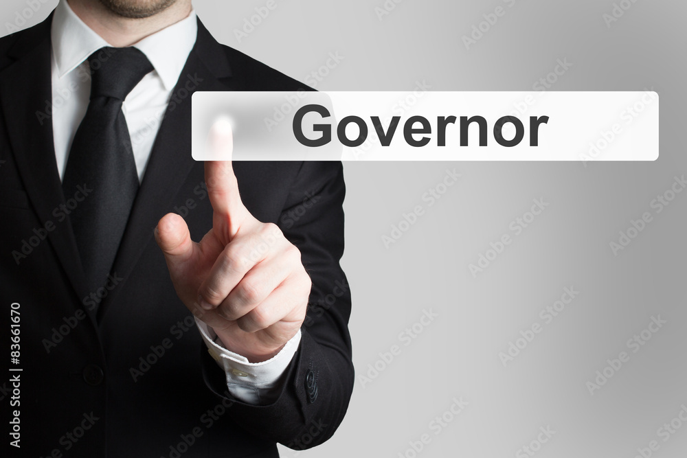 businessman in office pushing button governor businessman in office pushing button governor