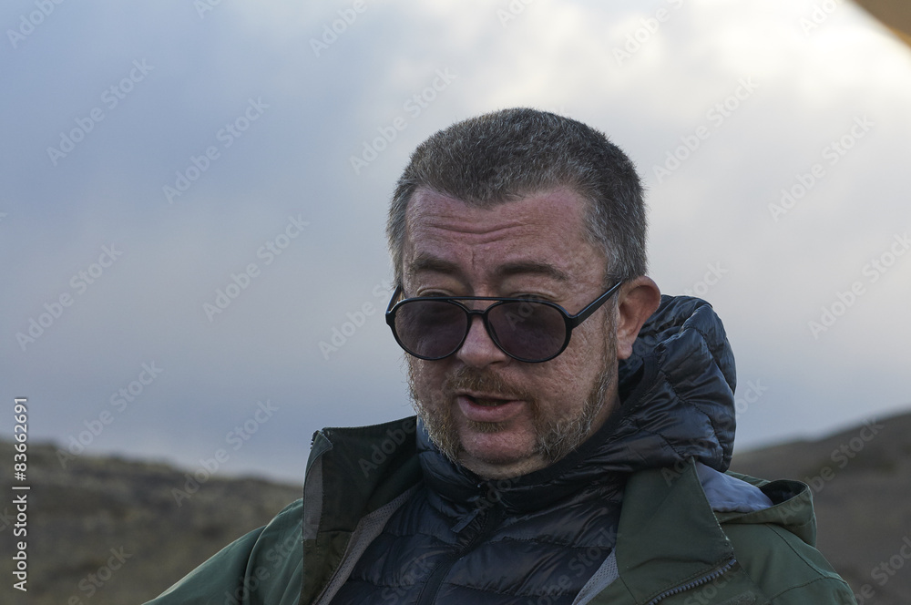 Portrait of a middla-aged man in open air in Altai Portrait of a middla-aged man in open air in Altai