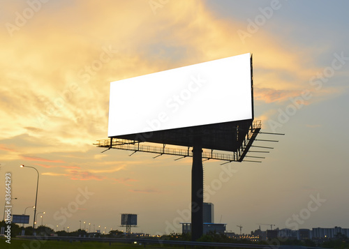 Silhouette billboard with blank space for advertising at sunset.