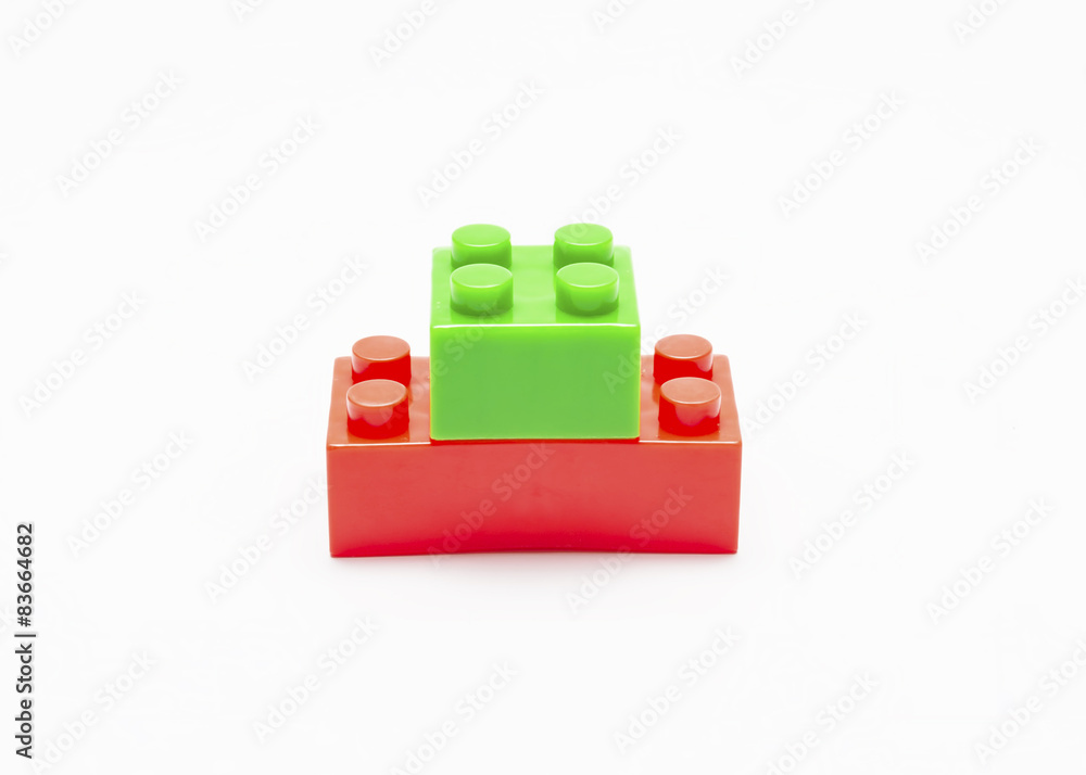 Green and red toy plastic buildings block Green and red toy plastic buildings block