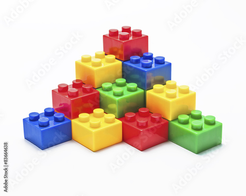 Colorful stacked toy building blocks.
