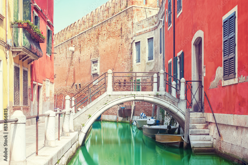 Small bridge over a canal in Venice, Italy.