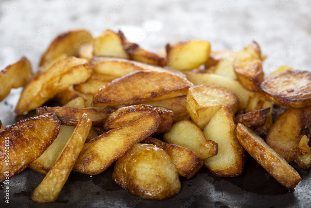 Fresh homemade fried potato wedges