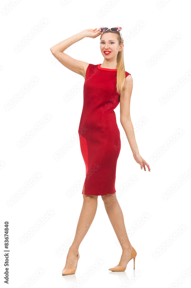 Fototapeta premium Pretty young woman in red dress isolated on white