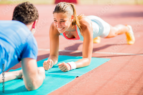 Woman training with personal trainer