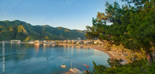 aerial view of bay and resort beach in sunrise
