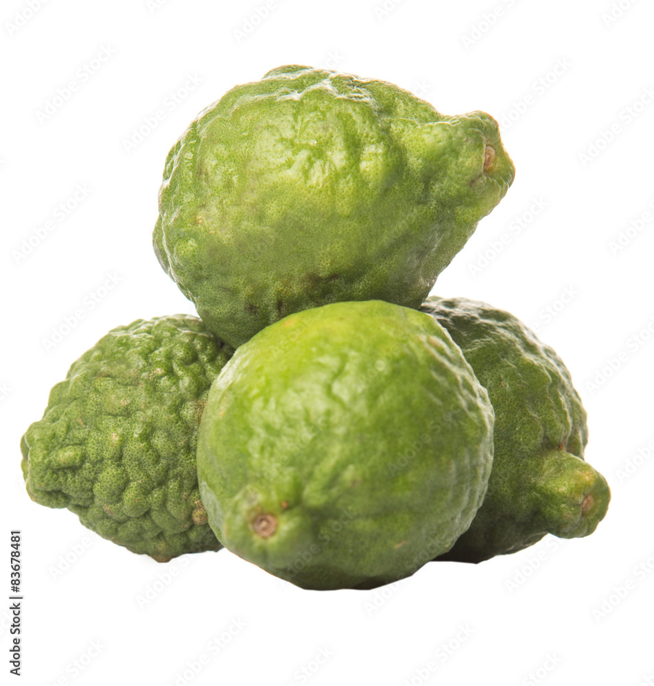 Kaffir or makrut lime over white background Kaffir or makrut lime over white background