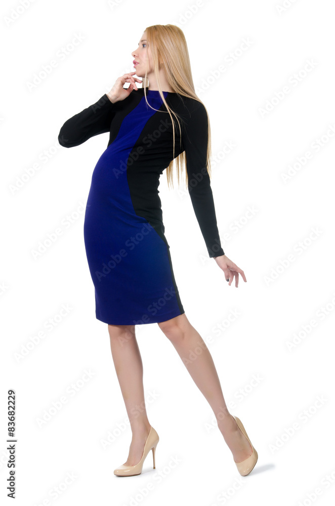Fototapeta premium Pretty pregnant woman in black dress isolated on white