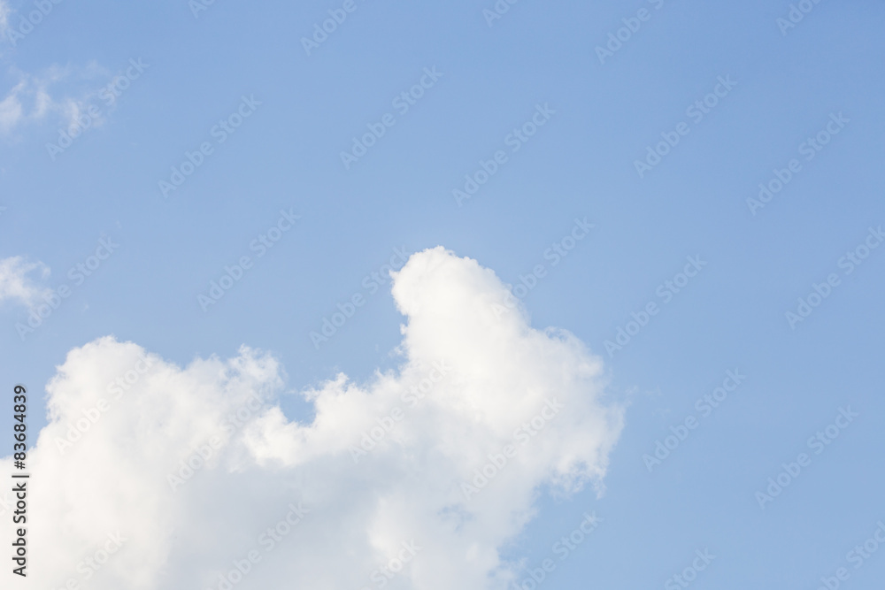White cloud and blue sky background image.