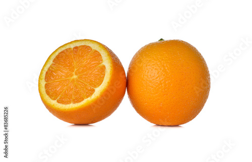 whole ripe orange on white background