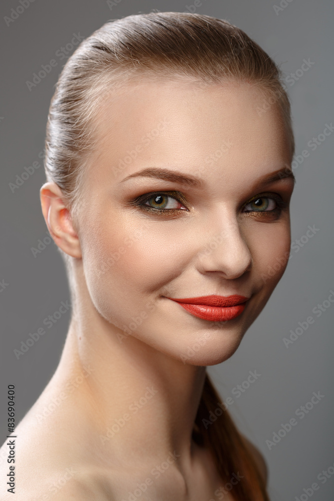 Portrait of a smiling beautiful girl with bright makeup Portrait of a smiling beautiful girl with bright makeup