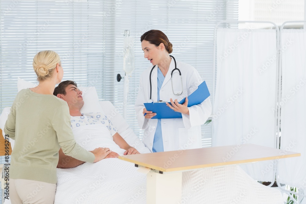 Fototapeta premium Doctor checking her patient