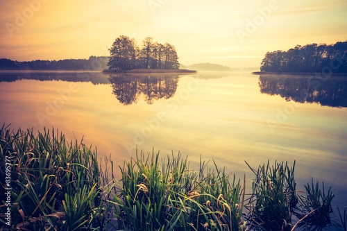 Fototapeta Naklejka Na Ścianę i Meble -  Vintage photo of sunset lake