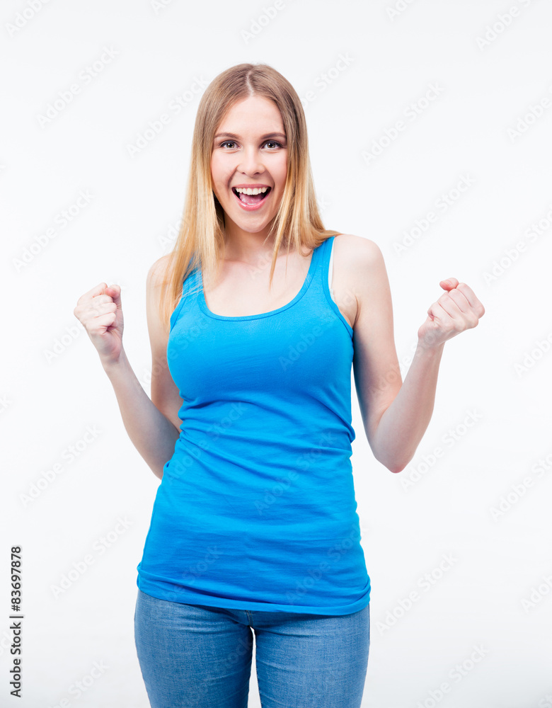 Fototapeta premium Pretty casual woman celebrating a triump