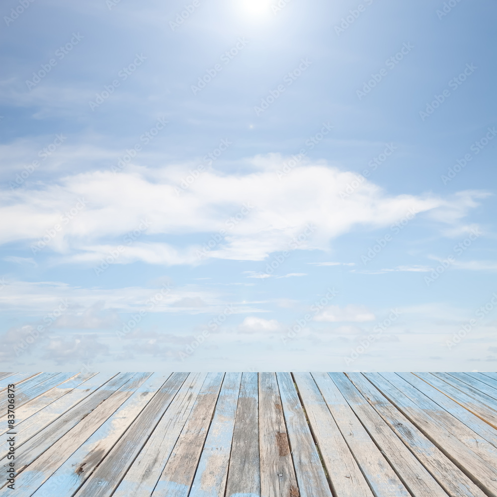 wooden floor with beautiful blue sky scenery for background