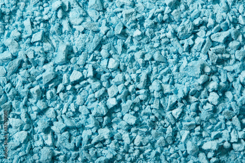 Blue eye shadow crushed, cosmetic powder texture background