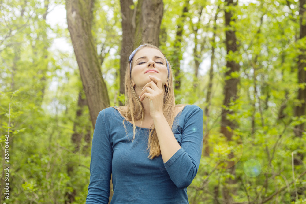 Woman enjoying nature withe eyes closed Woman enjoying nature withe eyes closed