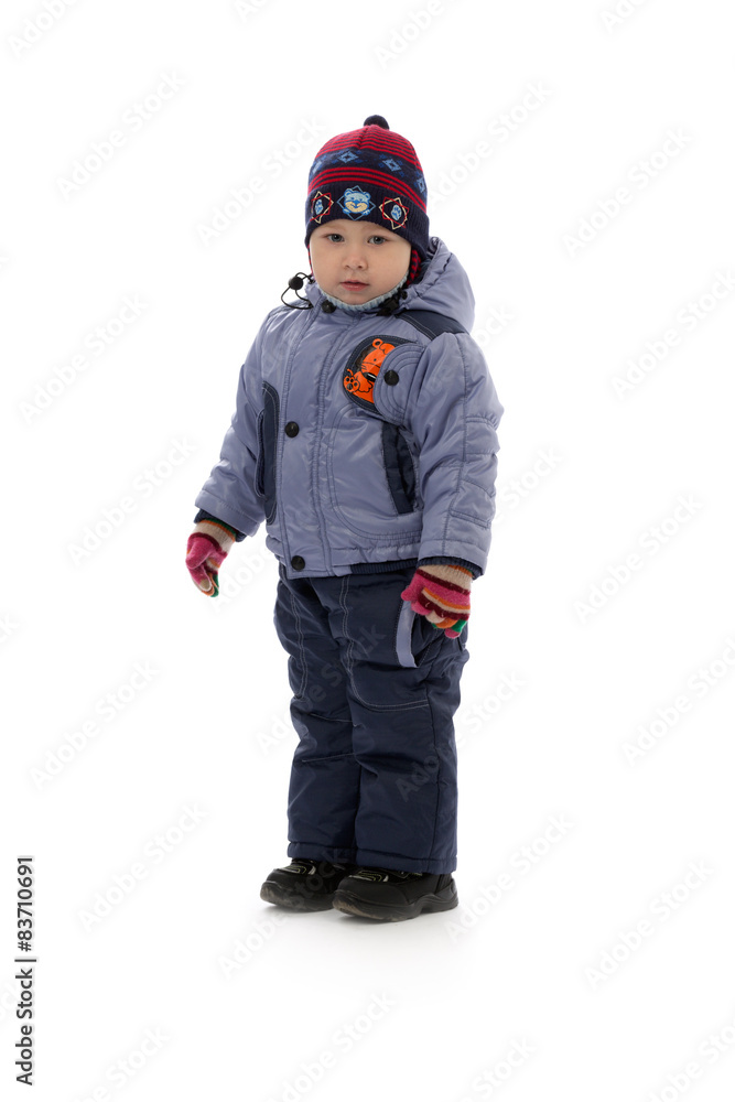 child of three in winter clothes child of three in winter clothes