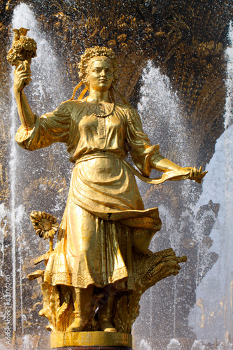 Girl with a fountain of friendship Ukraine © kostin77