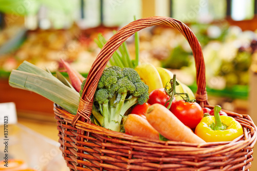 Colorful fresh vegetables in shopping basket