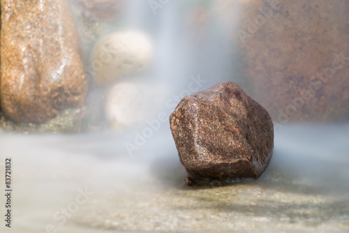 small granite rock stone flooded of water