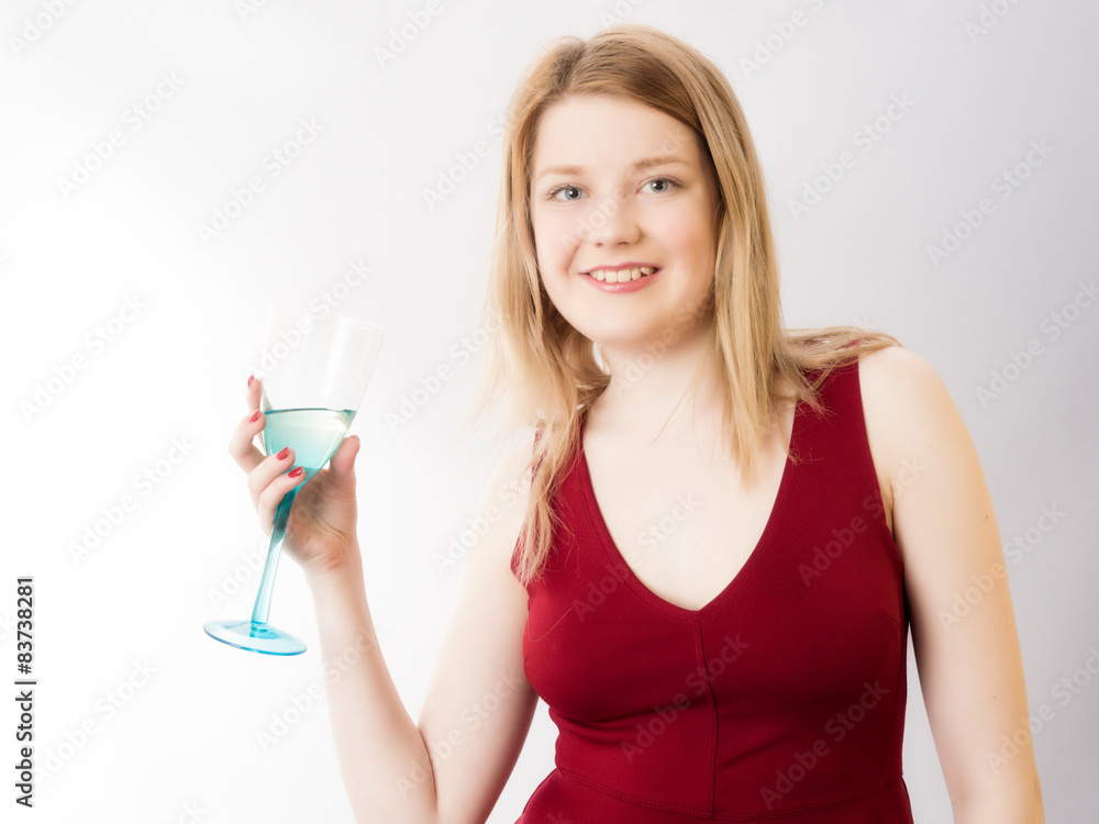 Sexy Blond in Red Dress and Drinking Glass of Wine Sexy Blond in Red Dress and Drinking Glass of Wine