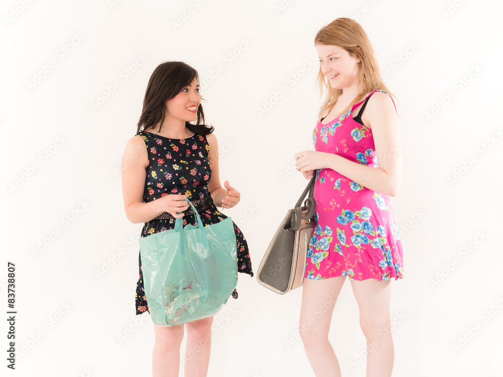 Two Shopping Women Looking at Each Other Two Shopping Women Looking at Each Other