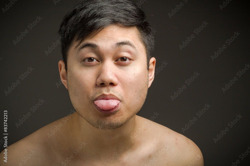 Obraz premium Model isolated sticking tongue out