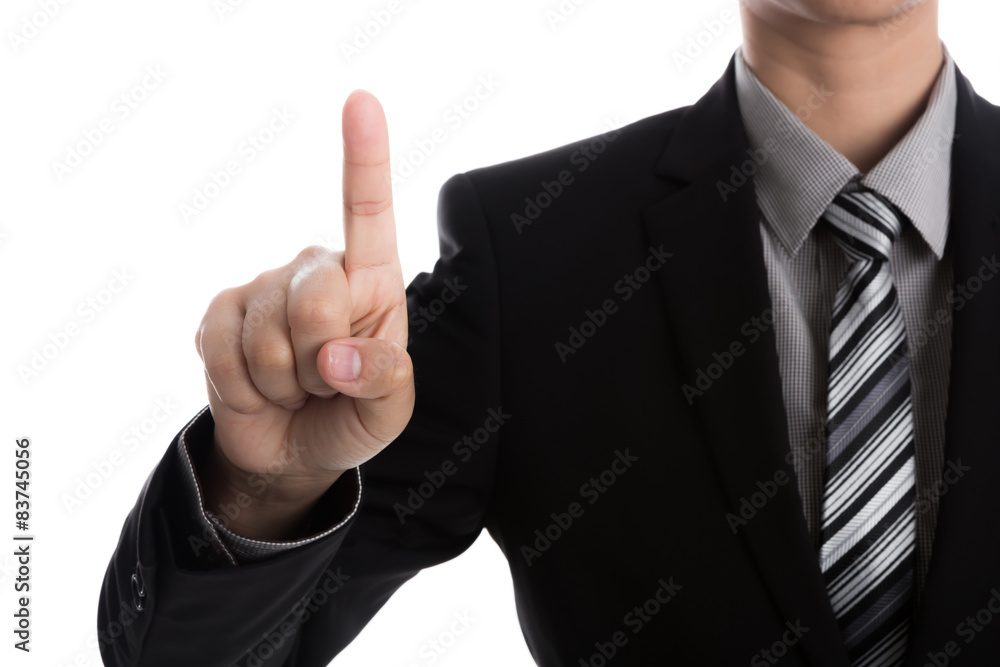 Business man touching an imaginary screen against white backgrou Business man touching an imaginary screen against white backgrou