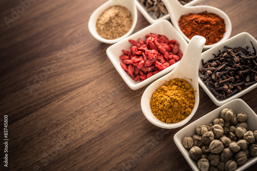 Wooden table of colorful spices