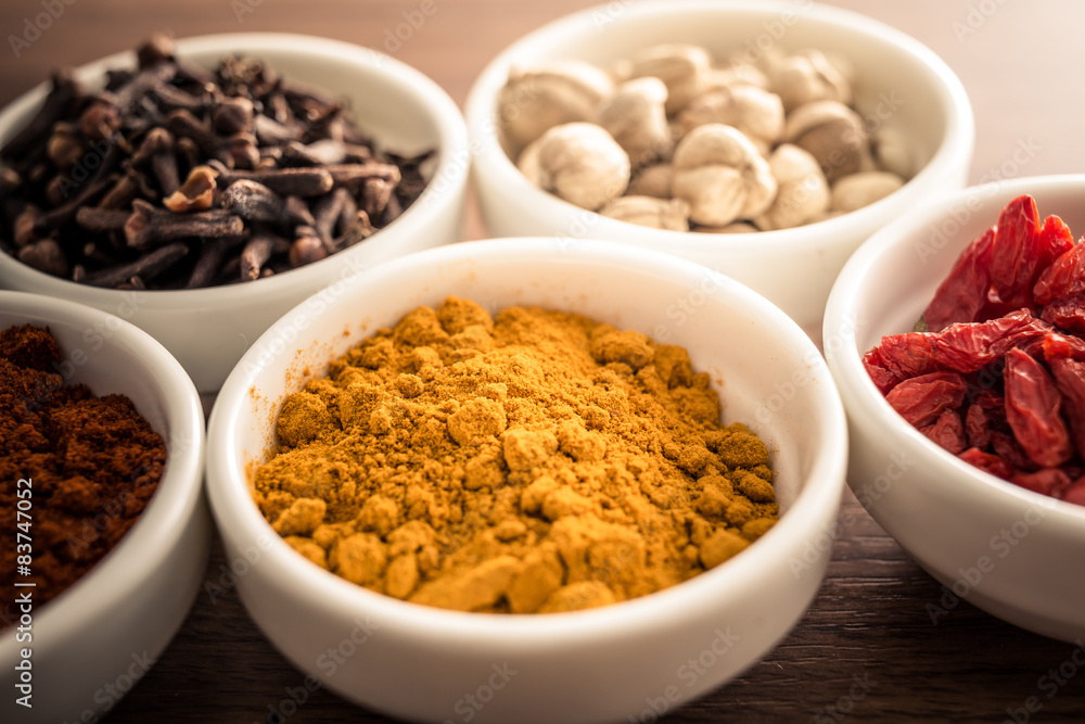 Wooden table of colorful spices