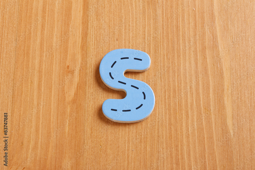S, spell by woody puzzle letters with woody background S, spell by woody puzzle letters with woody background