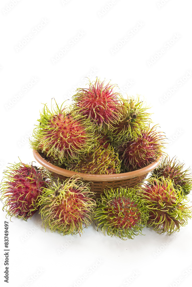 Rambutan Fruit with basket on white background Rambutan Fruit with basket on white background