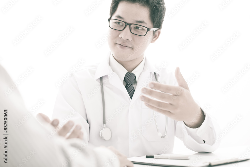 bright picture of male doctor with patient bright picture of male doctor with patient