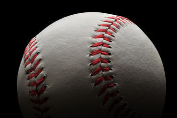 Baseball on black background