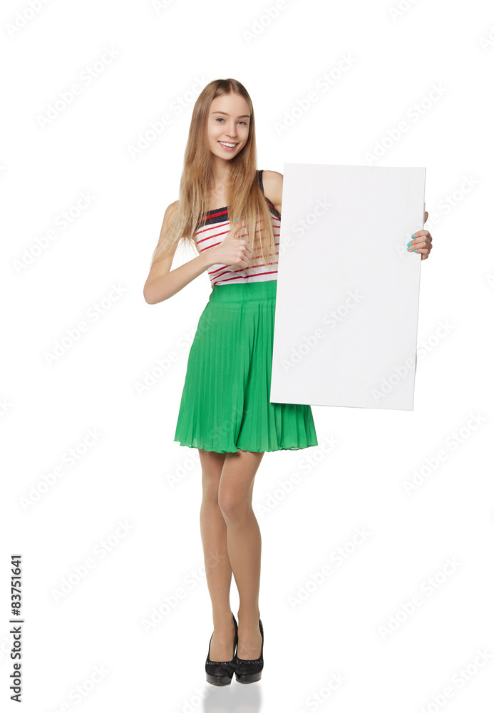 Full length of beautiful woman standing behind, holding white bl Full length of beautiful woman standing behind, holding white bl