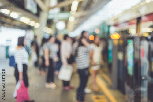 Blurred background : People stand at the sky train station, bang